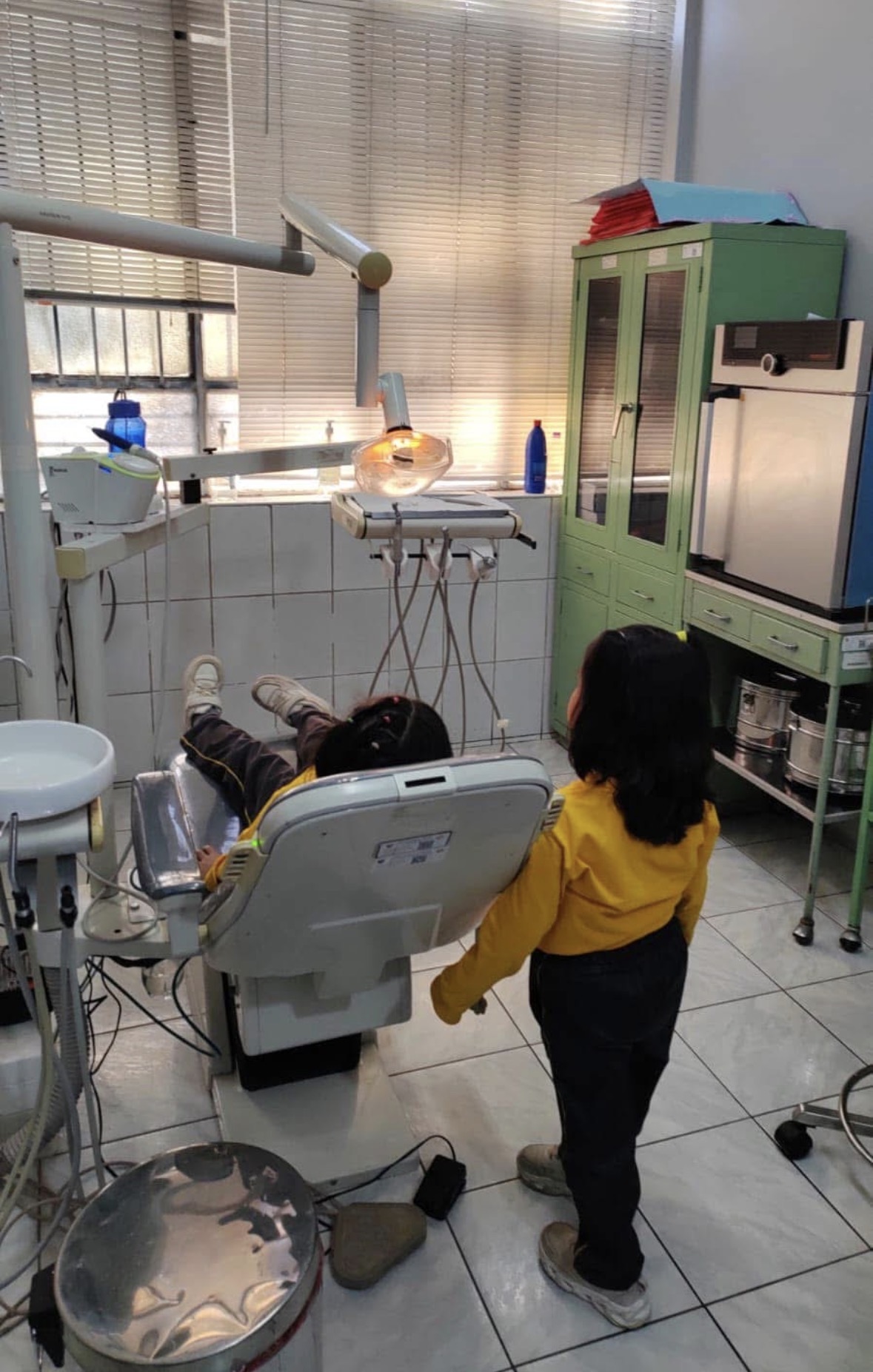 Dental care for a girl at the home