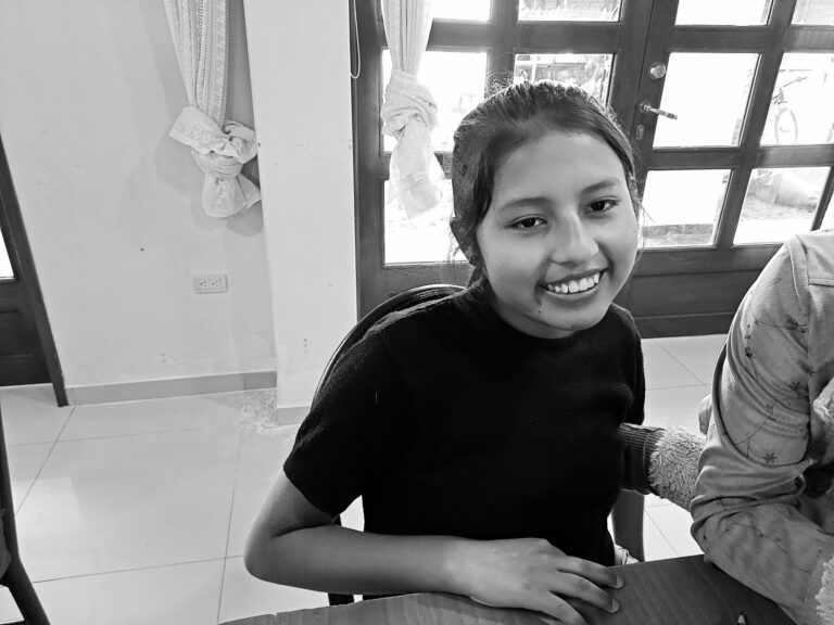 Black and white portrait of a girl at the home