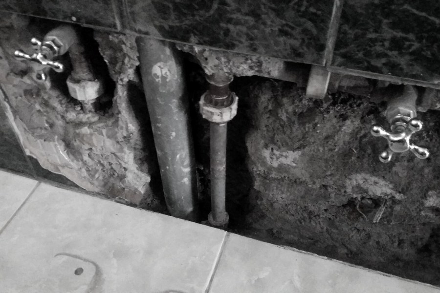 Broken plumbing in a marginal community home